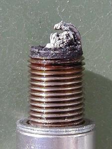 fouled spark plugs can cause ignition misfire and an emissions failure